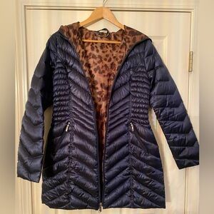 Laundry blue puffer hooded coat with leopard print interior.